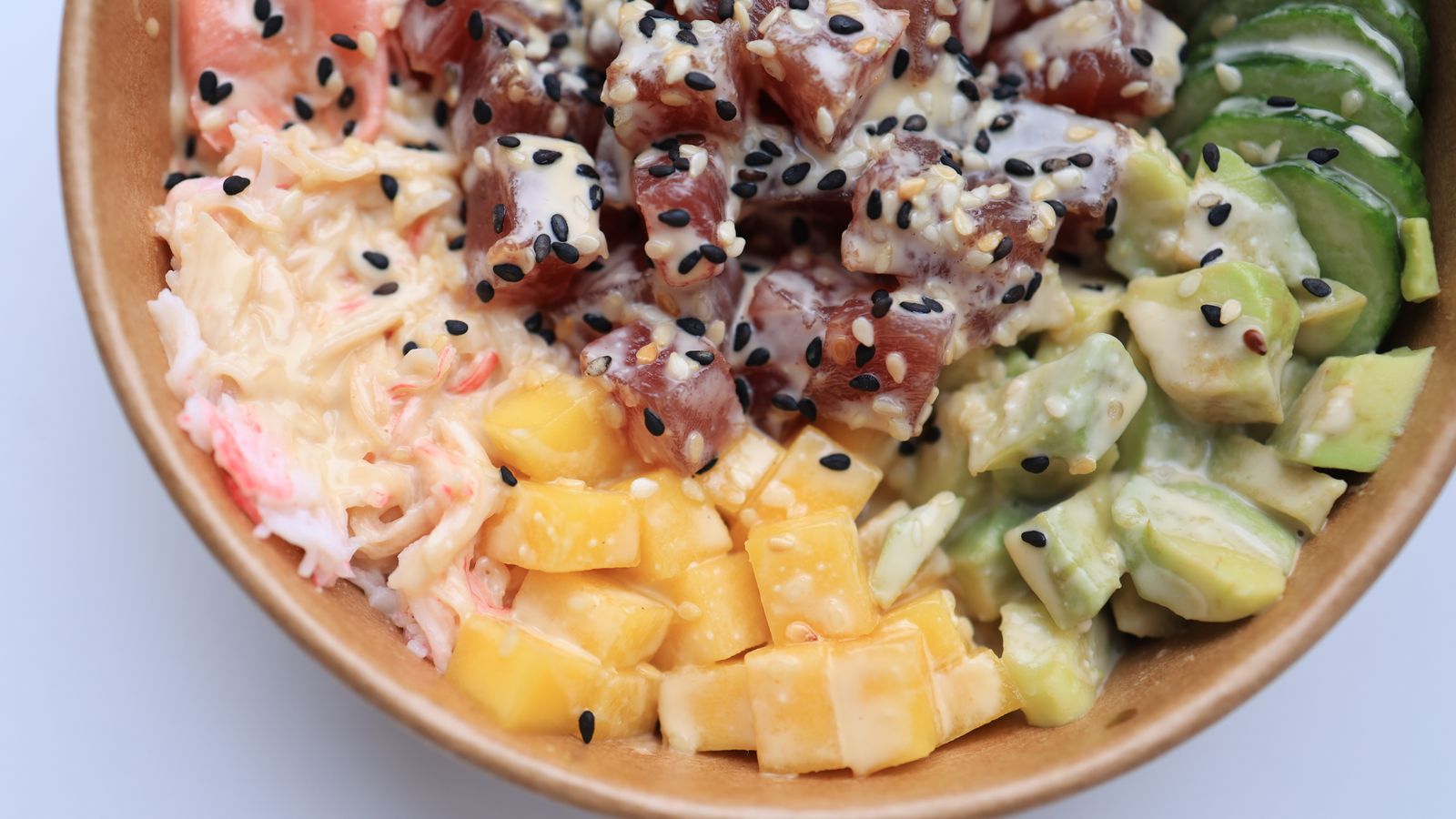 Poke bowl with ahi tuna, avocado and pineapple